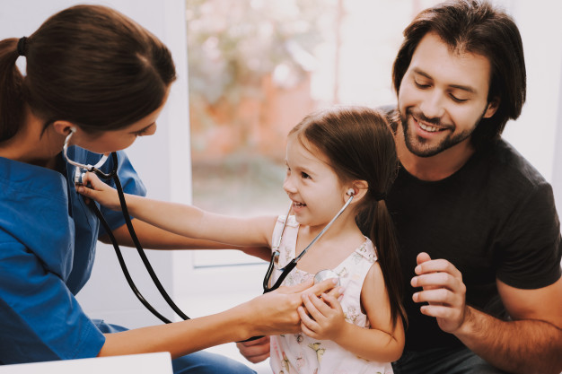 An employee drives a positive patient experience with a small child
