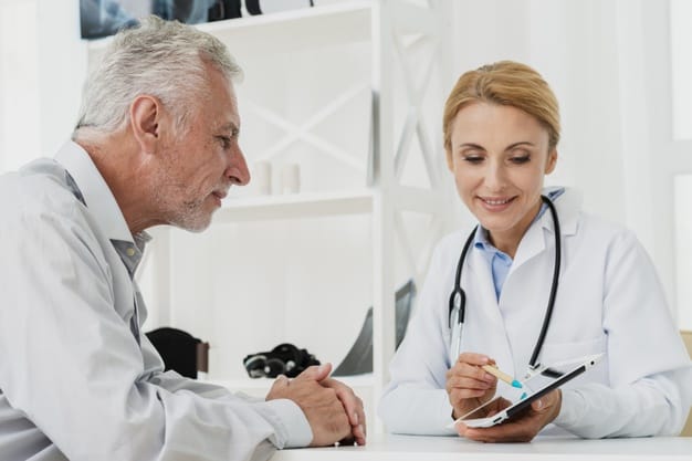 A medical employee drives a positive patient experience with an older man